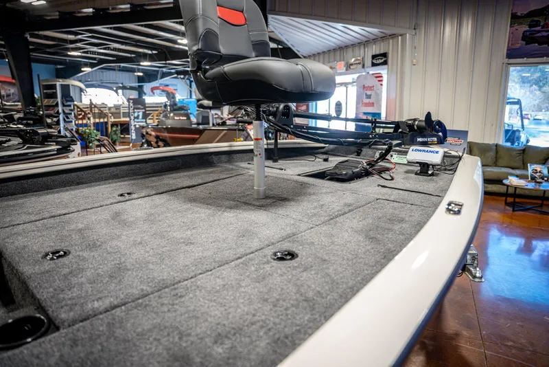 Slide: The Image of 2025 Bass Tracker PRO TEAM 190 boat interior with fishing seat and equipment. - 7