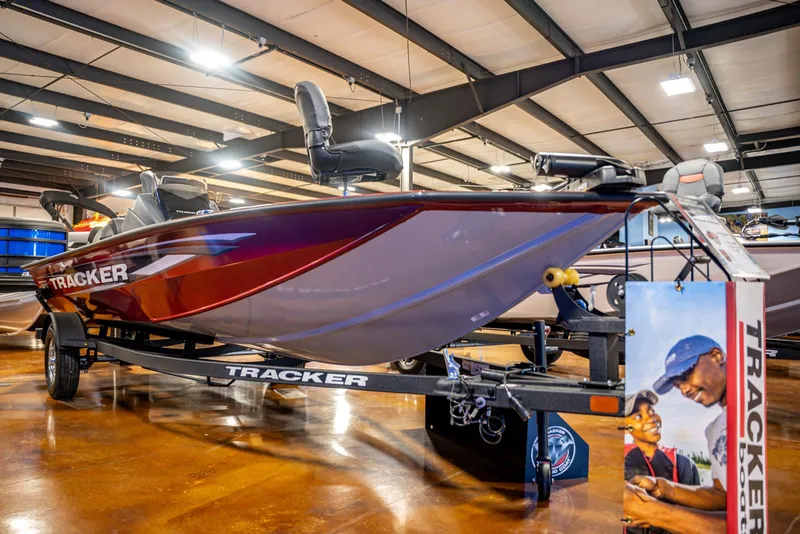 The Image of 2025 Bass Tracker Pro Team 175 boat displayed in showroom. - 1