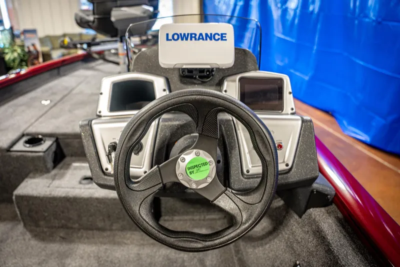 Slide: The Image of 2025 Bass Tracker Pro Team 175 boat dashboard with Lowrance electronics. - 13