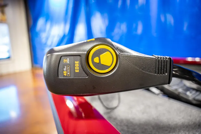 Slide: The Image of Close-up of 2025 Bass Tracker Pro Team 175 boat control panel. - 5