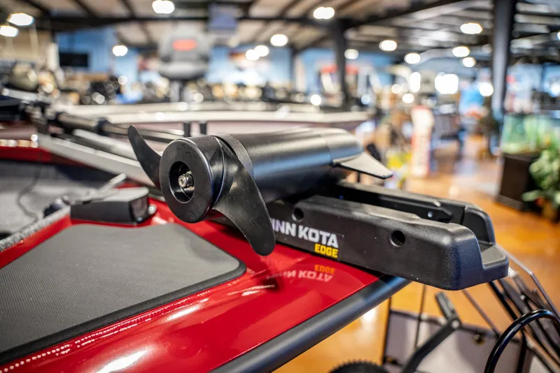 Slide: The Image of 2025 Bass Tracker Pro Team 175 with Minn Kota Edge trolling motor in showroom. - 4