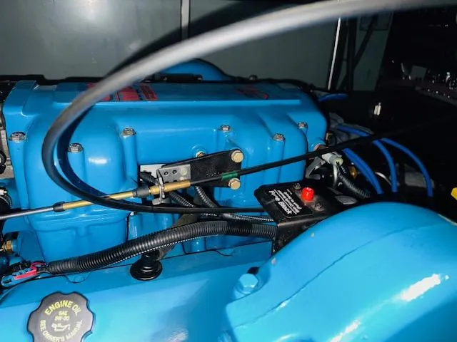 Slide: The Image of Engine compartment of 1999 Silverton 392 Motor Yacht with blue components. - 29