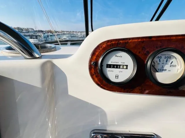 Slide: The Image of Close-up of 1999 Silverton 392 Motor Yacht dashboard gauges. - 8