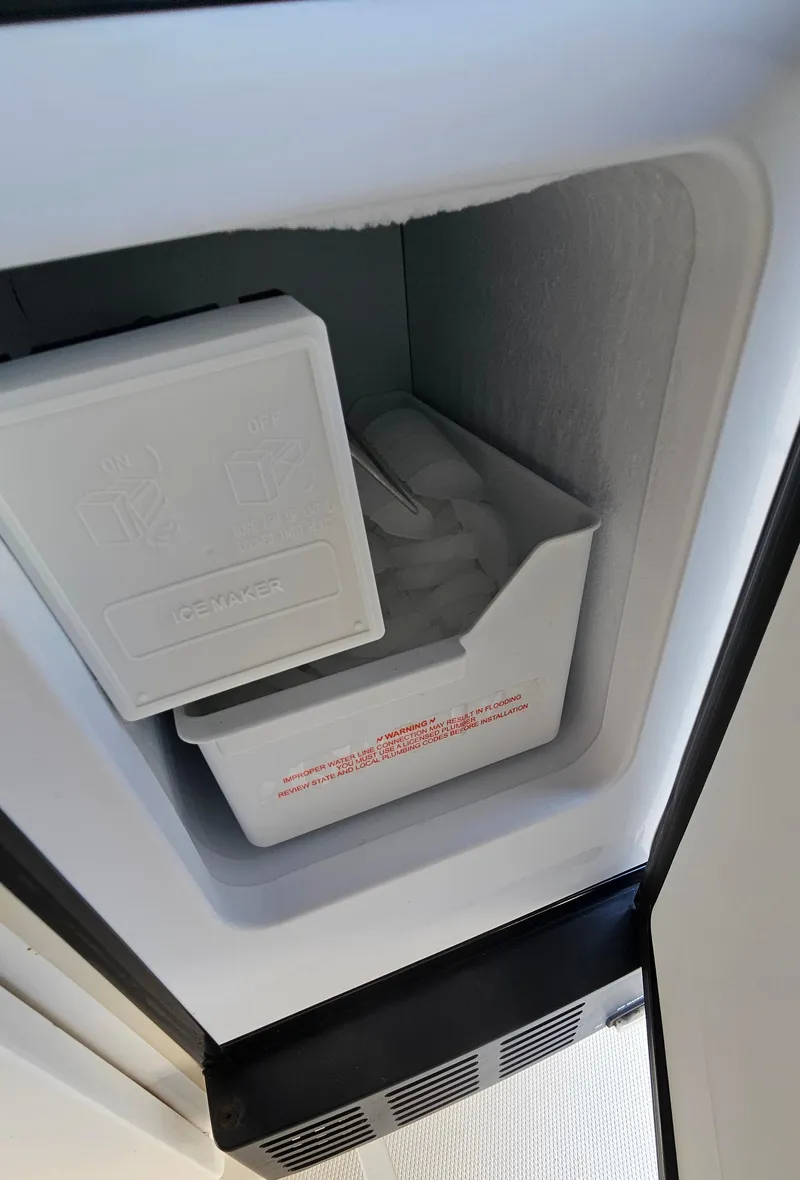 Slide: The Image of Ice maker inside a 2005 Silverton 330 Sport Bridge yacht. - 37