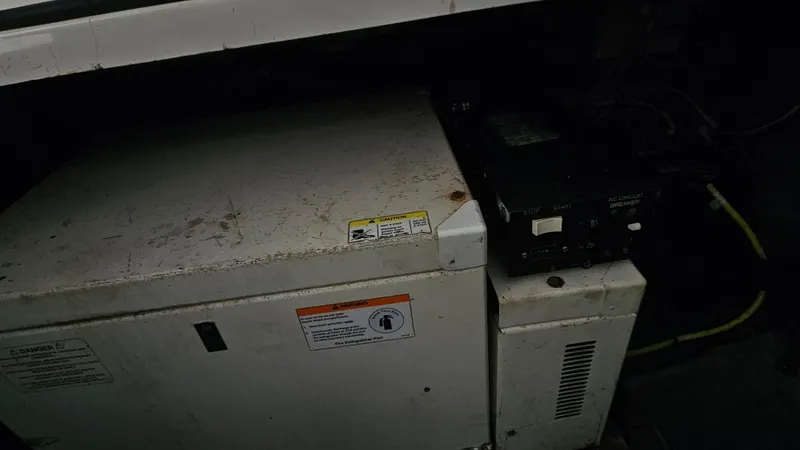 Slide: The Image of Engine compartment of a 2005 Silverton 330 Sport Bridge boat. - 43