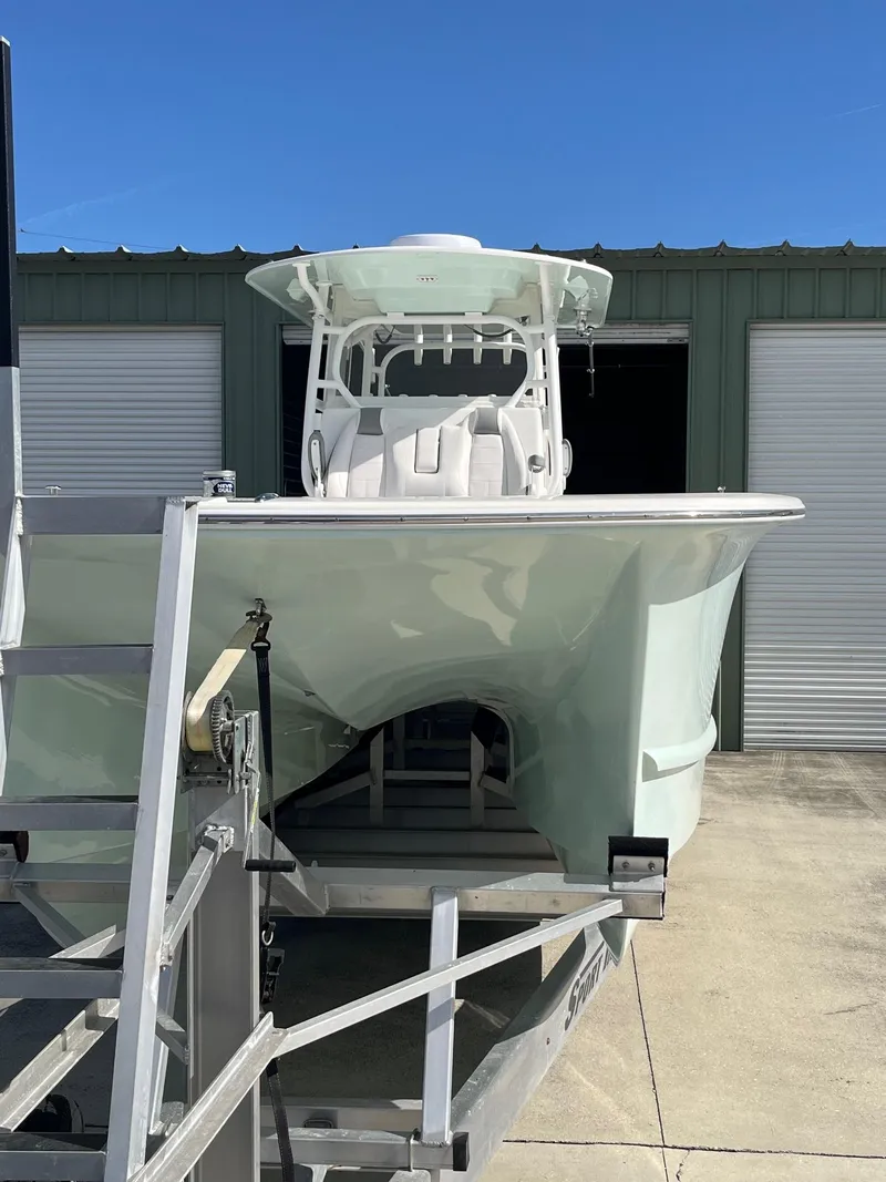 Slide: The Image of 2021 Tideline 365 boat on trailer, parked outside storage facility. - 10