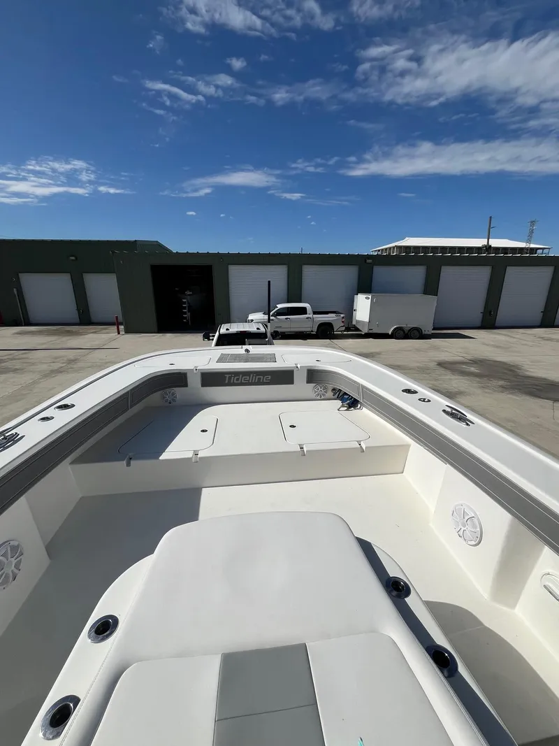 Slide: The Image of 2021 Tideline 365 boat in a marina with clear blue sky. - 17