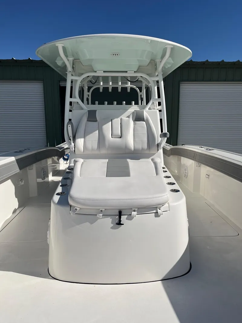 Slide: The Image of 2021 Tideline 365 boat with center console and cushioned seating. - 30