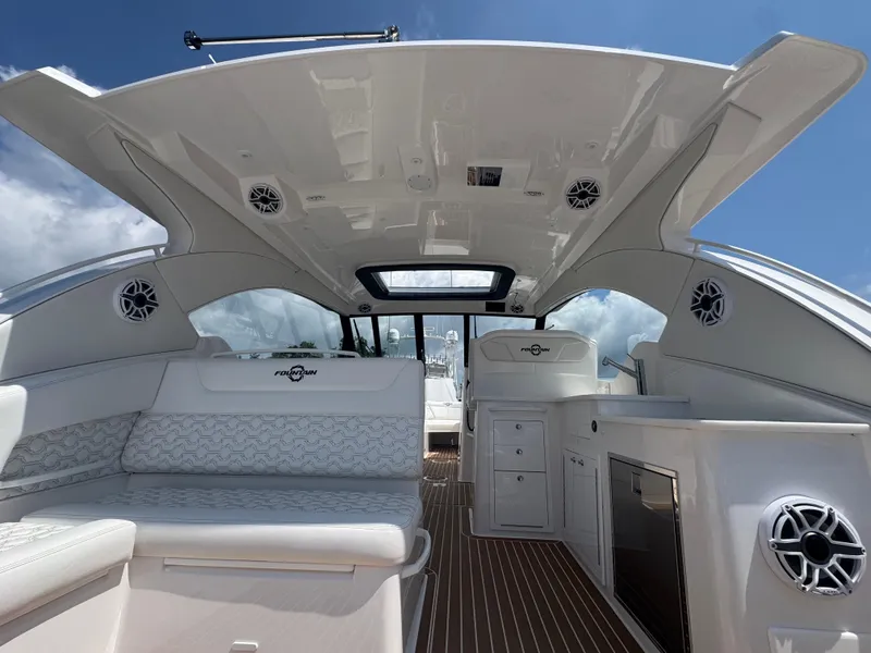 Slide: The Image of Luxurious interior of 2025 Fountain 39 DX boat with sleek seating and modern amenities. - 11
