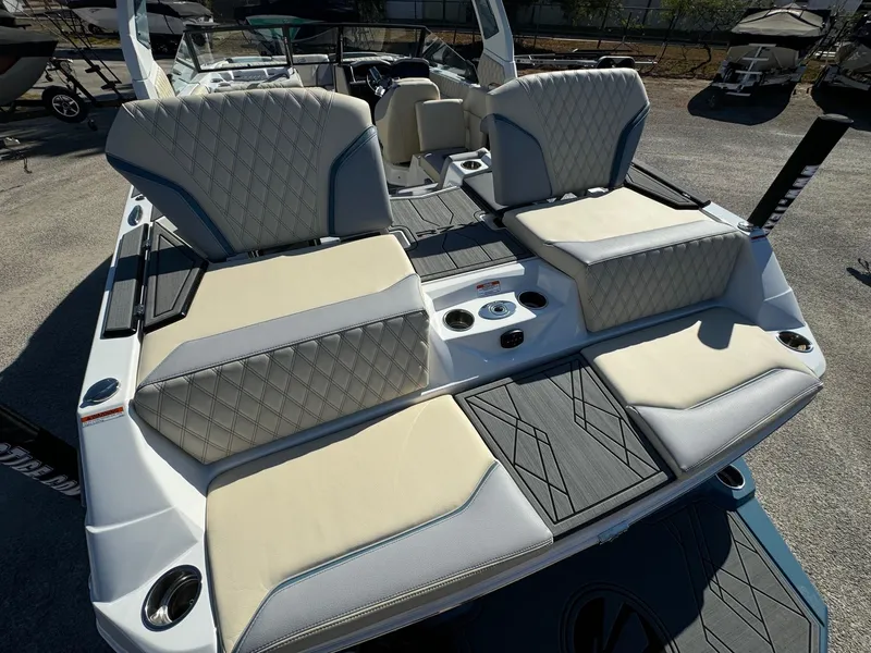 Slide: The Image of 2025 Tigé 22RZX boat with luxurious seating and modern design. - 6