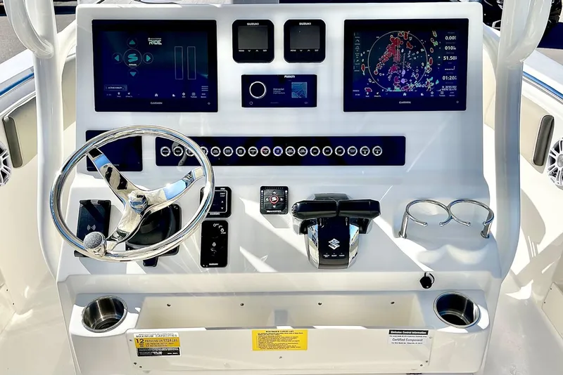 Slide: The Image of 2025 Key West 263 FS boat dashboard with advanced navigation and control systems. - 2