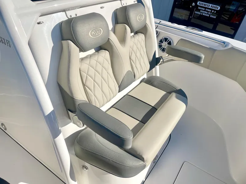 Slide: The Image of 2025 Key West 263 FS boat seats with elegant gray and beige upholstery. - 20