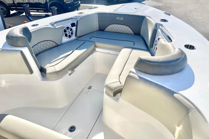 Slide: The Image of 2025 Key West 263 FS boat interior with cushioned seating and modern design. - 21