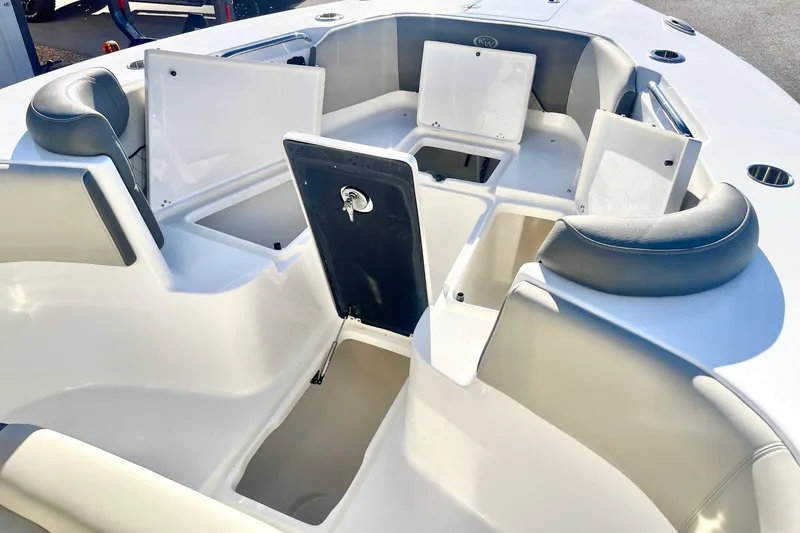 Slide: The Image of 2025 Key West 263 FS boat interior with open storage compartments. - 26