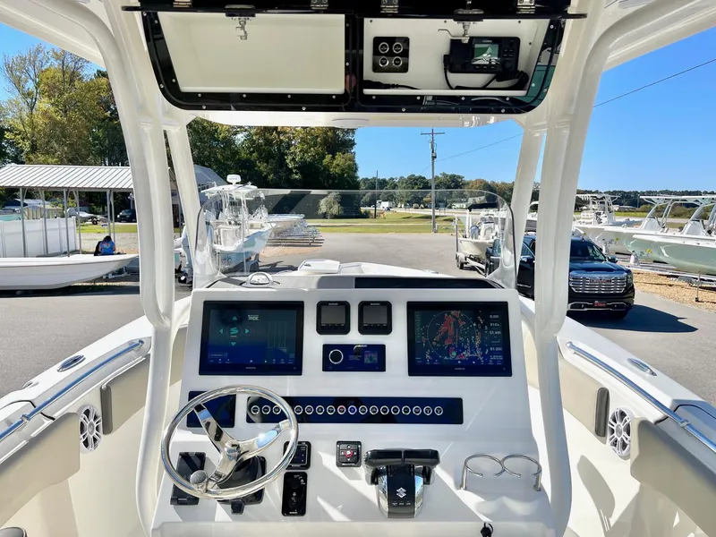 Slide: The Image of 2025 Key West 263 FS boat dashboard with advanced navigation systems. - 28