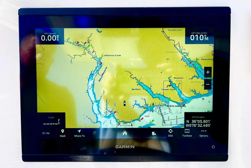 Slide: The Image of Garmin GPS display on 2025 Key West 263 FS boat, showing nautical map. - 33
