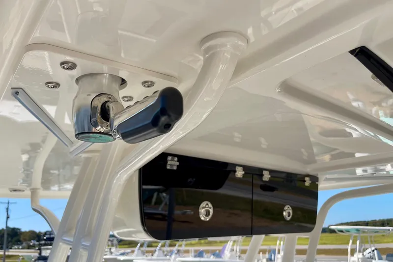Slide: The Image of Key West 263 FS 2025 boat detail, featuring a sleek overhead storage compartment. - 37