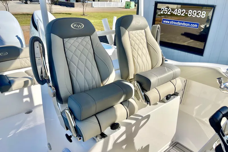 Slide: The Image of 2025 Key West 263 FS boat seats with quilted design and armrests. - 43