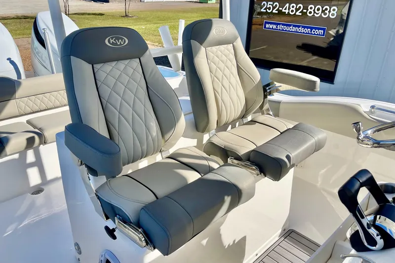 Slide: The Image of 2025 Key West 263 FS boat seats with quilted design and armrests. - 44