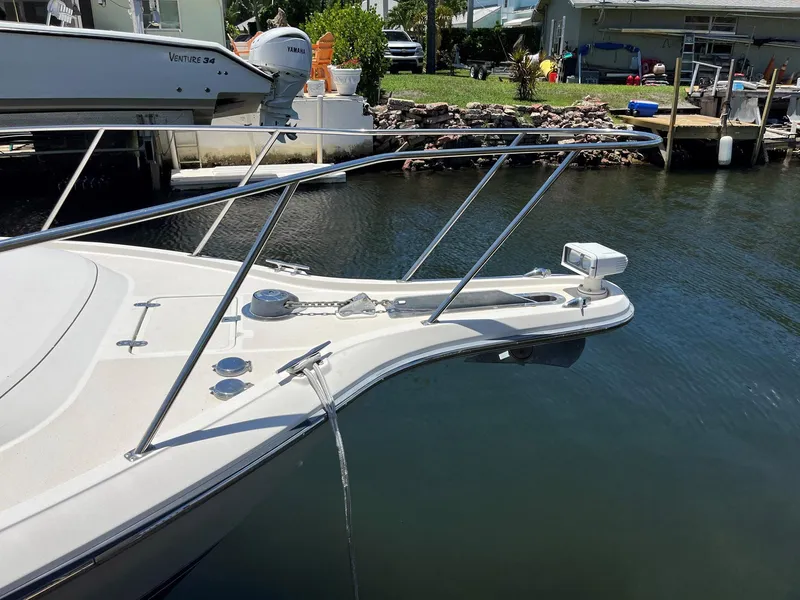Slide: The Image of Bow of 1994 Tiara Yachts 3600 Convertible Sportfish docked in marina. - 14