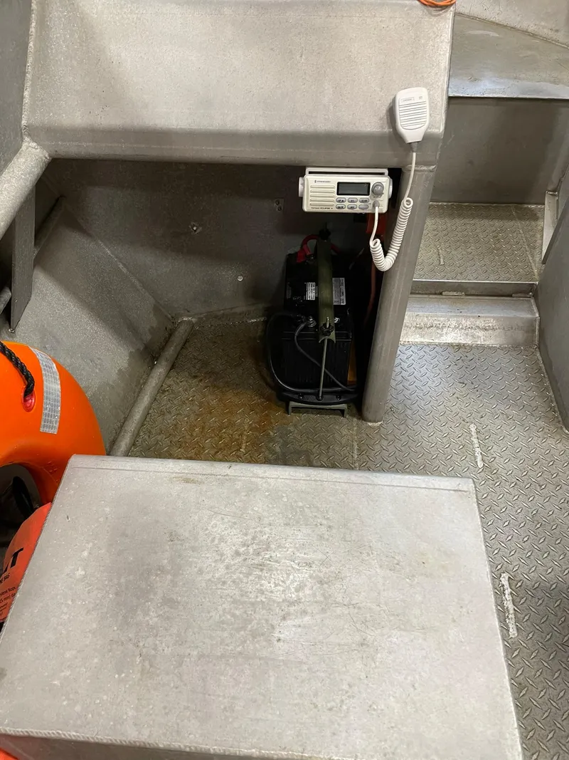 Slide: The Image of Interior of a 2003 custom work boat with communication equipment and safety gear. - 19