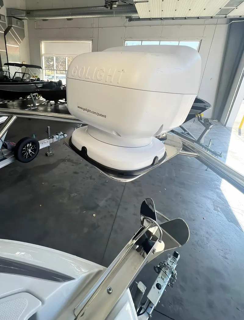 Slide: The Image of 2025 Crownline 280 CRX boat radar system in a showroom. - 17