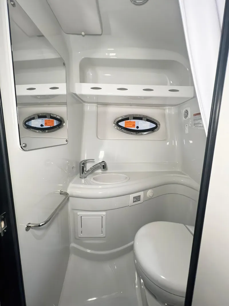 Slide: The Image of 2025 Crownline 280 CRX boat bathroom with modern fixtures and compact design. - 41