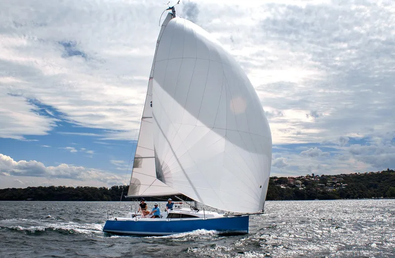 The Image of 2026 Catalina 276 sailboat gliding on a sunny day with white sails and blue hull. - 0