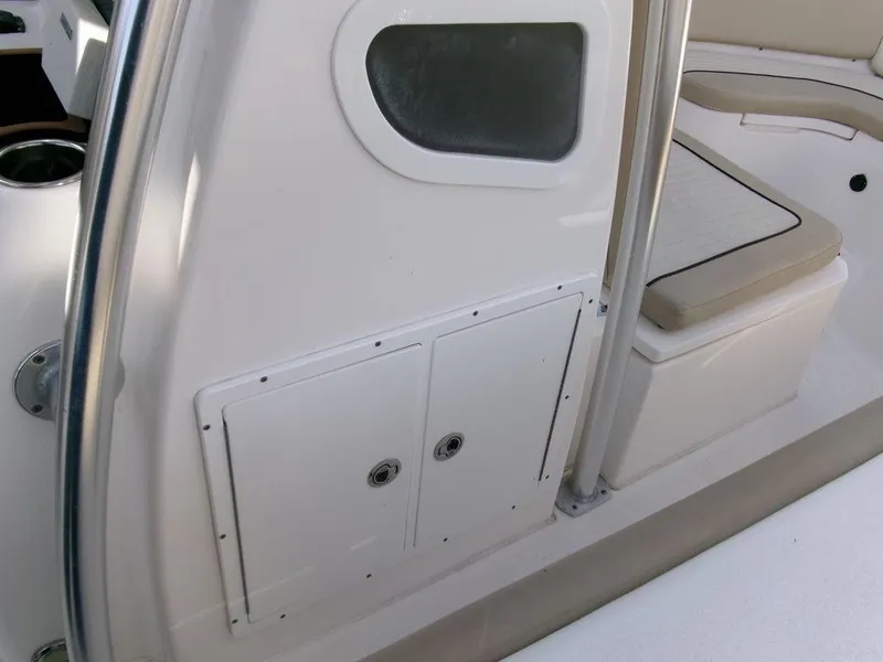 Slide: The Image of 2018 Sea Fox 266 Commander interior with storage compartments and seating. - 17