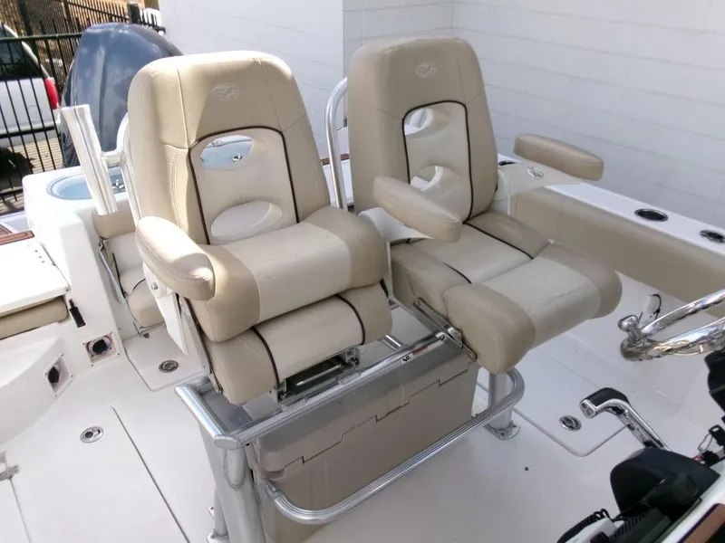 Slide: The Image of 2018 Sea Fox 266 Commander boat seats, beige leather, dual helm chairs. - 25