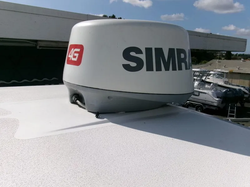Slide: The Image of Simrad radar on 2018 Sea Fox 266 Commander boat under clear sky. - 34