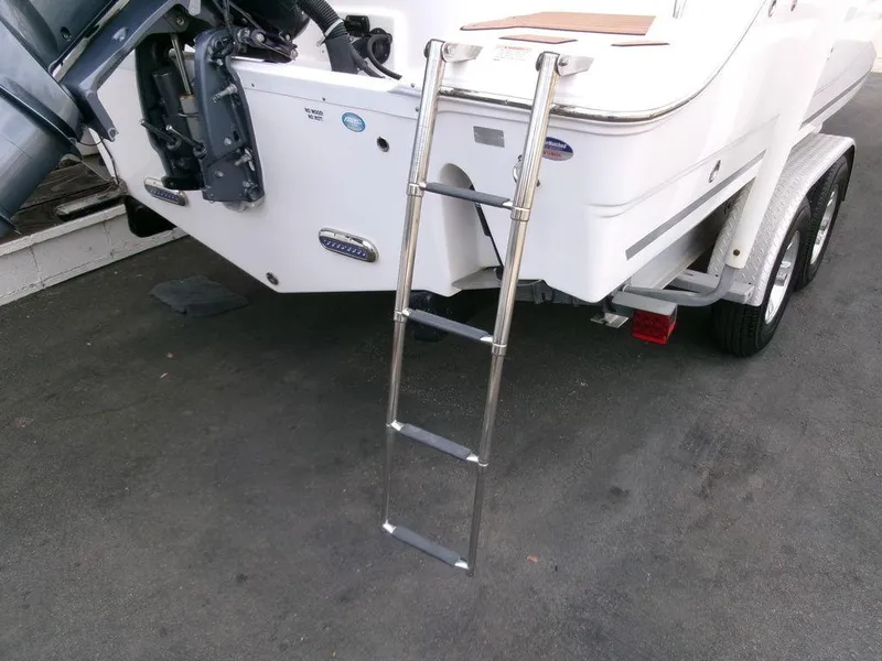 Slide: The Image of 2018 Sea Fox 266 Commander boat with ladder and trailer. - 36