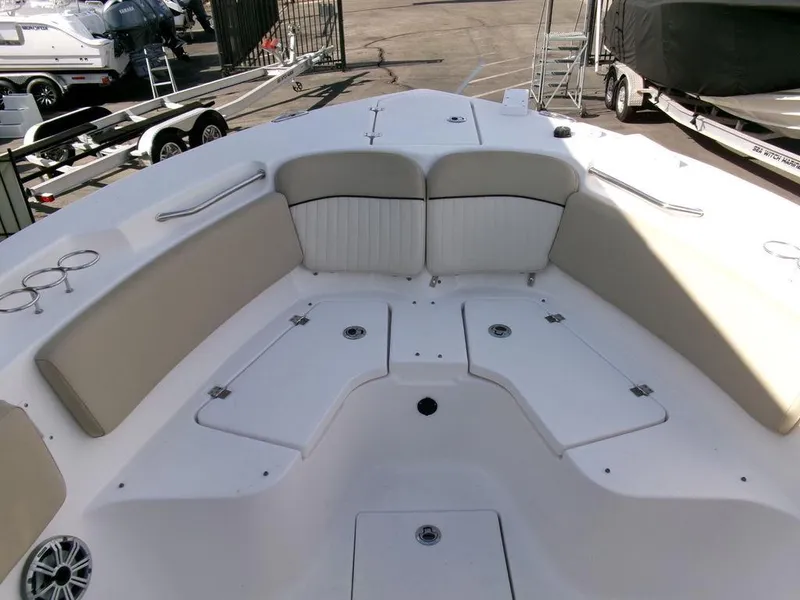 Slide: The Image of 2018 Sea Fox 266 Commander boat interior with spacious seating and storage compartments. - 8