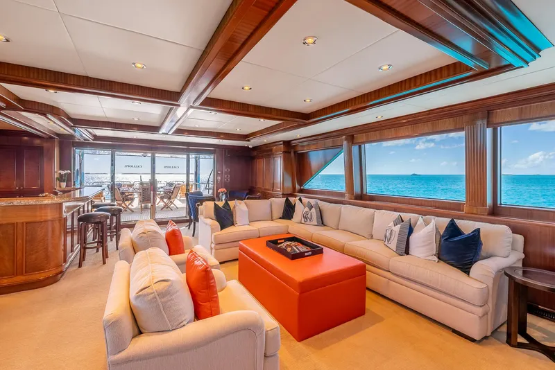 Slide: The Image of Luxurious Richmond Yachts 2007 interior with plush seating, ocean view, and elegant wood finishes. - 14