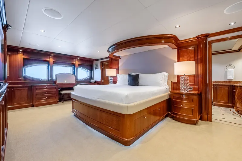 Slide: The Image of Luxurious Richmond Yachts 2007 bedroom with elegant wood finishes and large bed. - 17