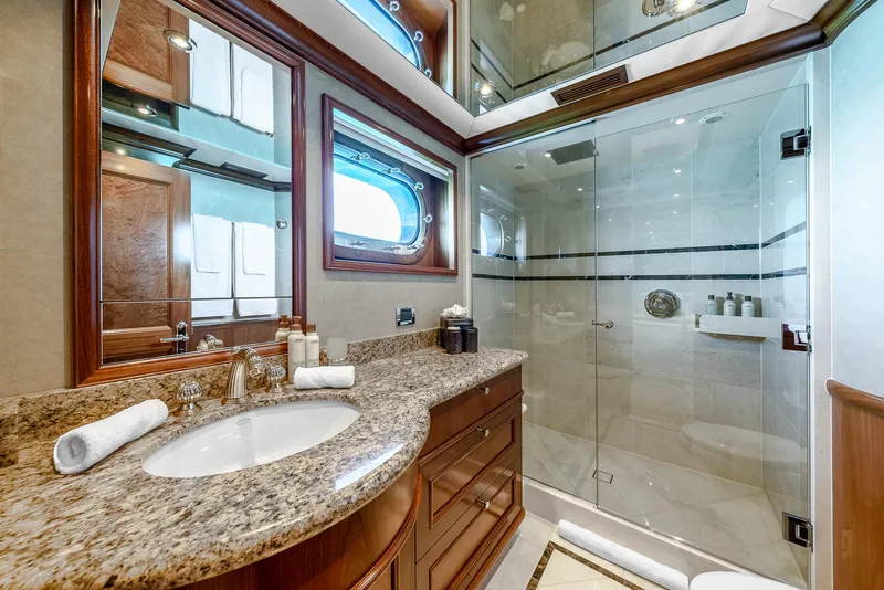 Slide: The Image of Luxurious yacht bathroom with granite countertop and glass shower, Richmond Yachts 2007 model. - 19