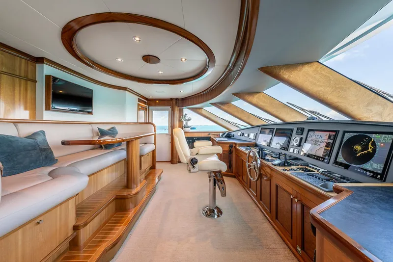 Slide: The Image of Luxurious 2007 Richmond Yachts Semi Displacement helm with modern navigation equipment and plush seating. - 21