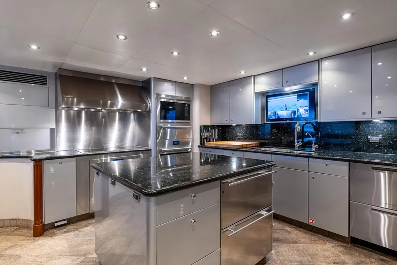 Slide: The Image of Luxurious yacht kitchen with modern stainless steel appliances and sleek cabinetry, Richmond Yachts 2007. - 24