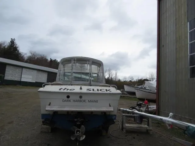 The Image of 1973 Slickcraft SS235 boat at dock in Dark Harbor, Maine. - 0