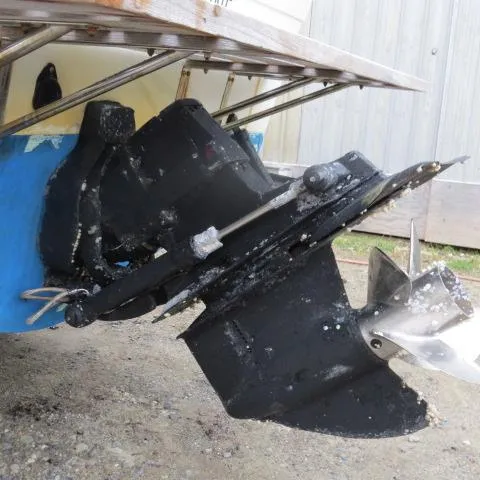 Slide: The Image of 1973 Slickcraft SS235 boat outboard motor and propeller detail. - 22