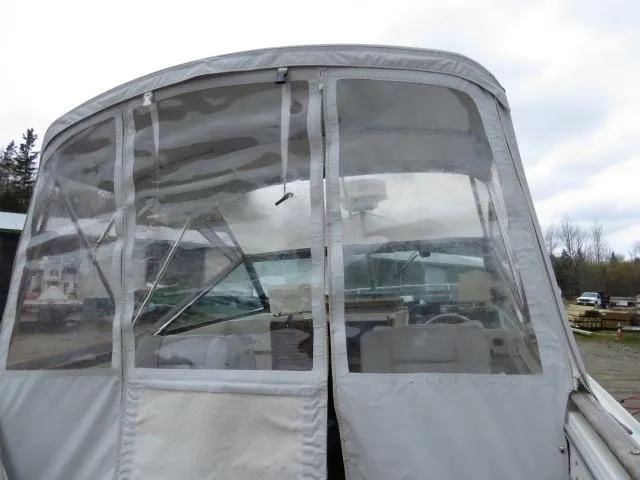Slide: The Image of 1973 Slickcraft SS235 boat with clear canopy and visible interior details. - 3