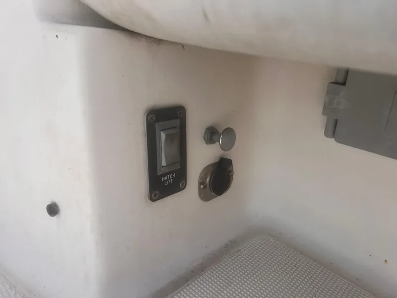 Slide: The Image of 1995 Tiara Yachts 2900 Open boat interior switch panel and controls. - 31