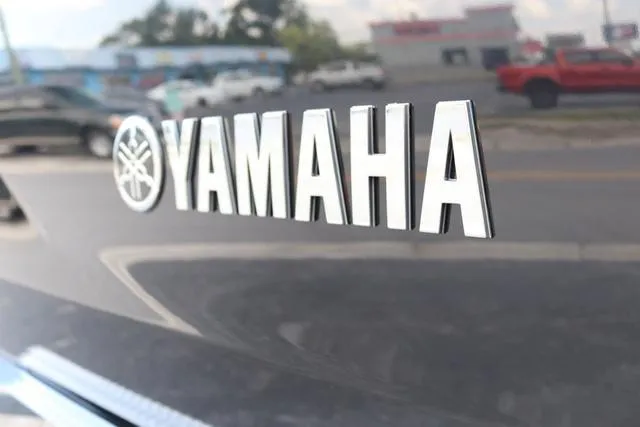 Slide: The Image of 2025 Yamaha Boats 222S interior with white seating and sleek design. - 10