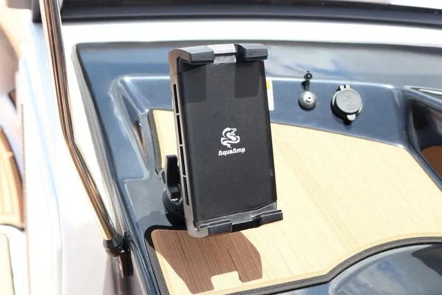 Slide: The Image of Yamaha Boats 2025 model 222S dashboard with AquaAmp phone holder. - 19