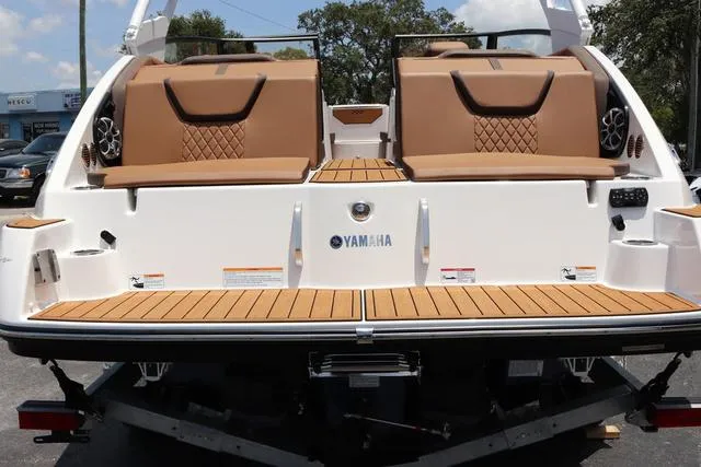 Slide: The Image of 2025 Yamaha Boats 222S, black galvanized model, featuring luxurious tan seating and sleek design. - 40