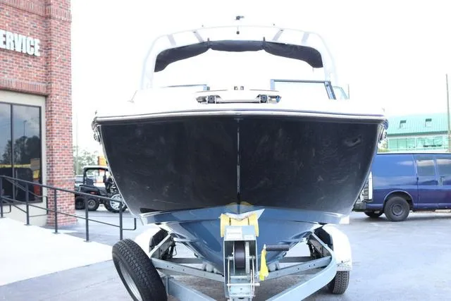 Slide: The Image of 2025 Yamaha Boats 222S interior storage with life jackets and accessories. - 8