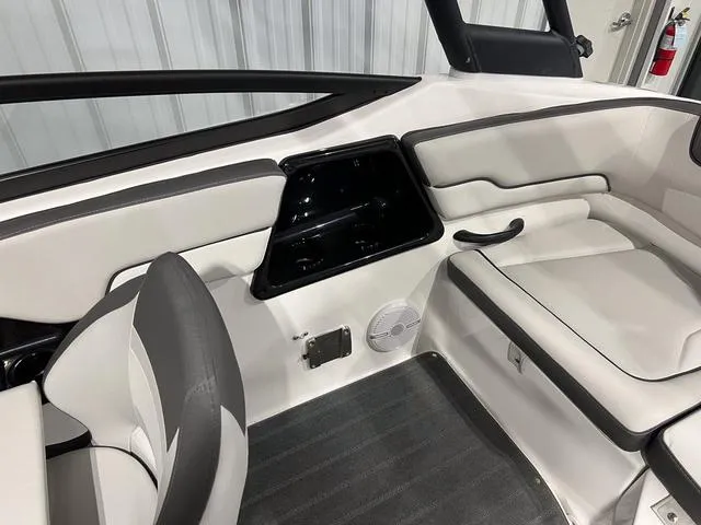 Slide: The Image of 2025 Yamaha AR190 boat interior with sleek white seating and modern design. - 11