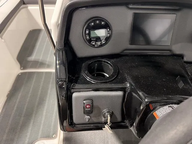 Slide: The Image of 2025 Yamaha AR190 boat dashboard with controls and display screen. - 16