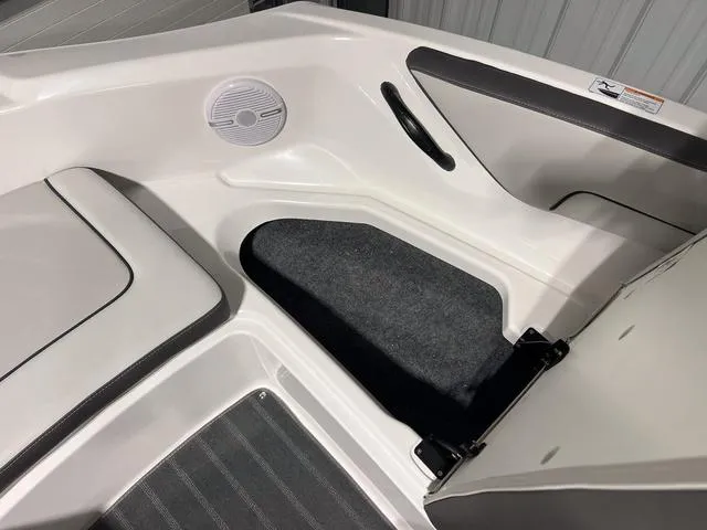 Slide: The Image of 2025 Yamaha AR190 boat interior with seating and speaker detail. - 22