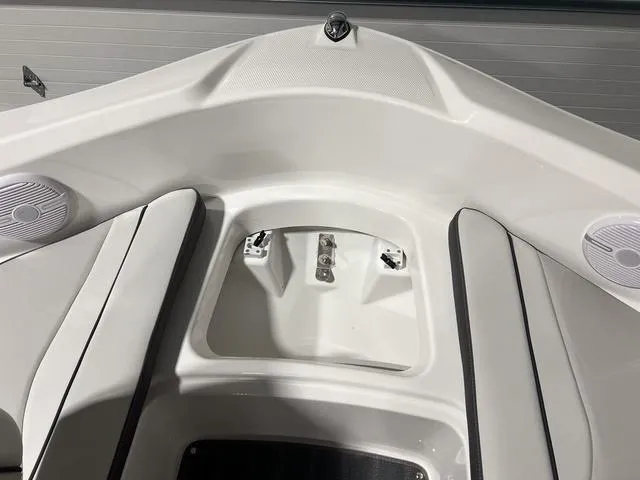 Slide: The Image of 2025 Yamaha Boats AR190 bow interior with seating and speakers. - 23